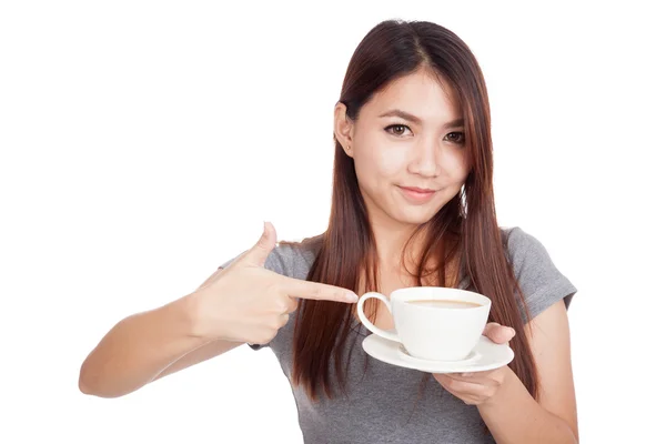 Young Asian woman point to cup of coffee — Stock Photo, Image