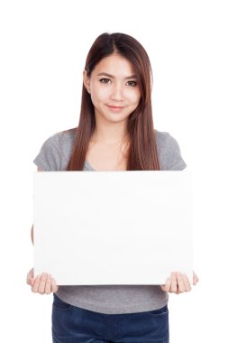 Genç Asyalı kadın gülümseme boş işareti ile