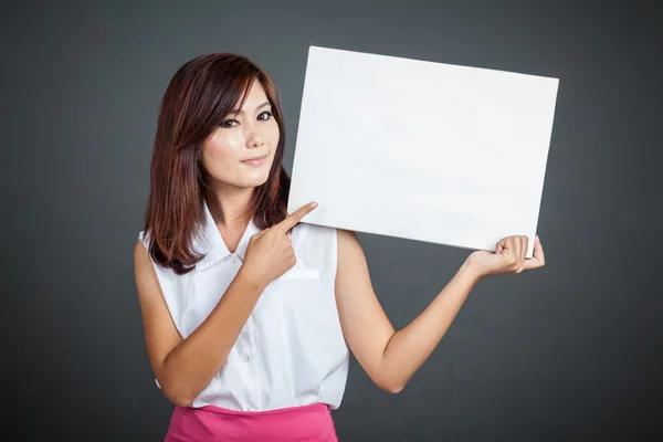 Asian girl point to blank sign — Stock Photo, Image