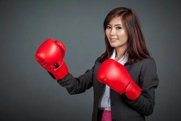 Asian businesswoman with boxing glove — Stock Photo, Image