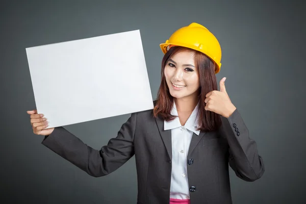 Asian engineer girl thumbs up  with a blank sign — Stock Photo, Image