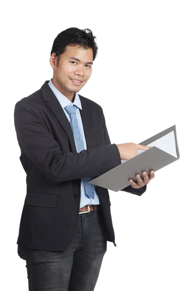 Asian businessman point to a folder and smile — Stock Photo, Image