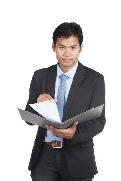 Asian businessman read paper on a folder — Stock Photo, Image