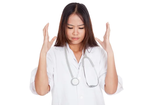 Frustrated Asian young female doctor — Stock Photo, Image