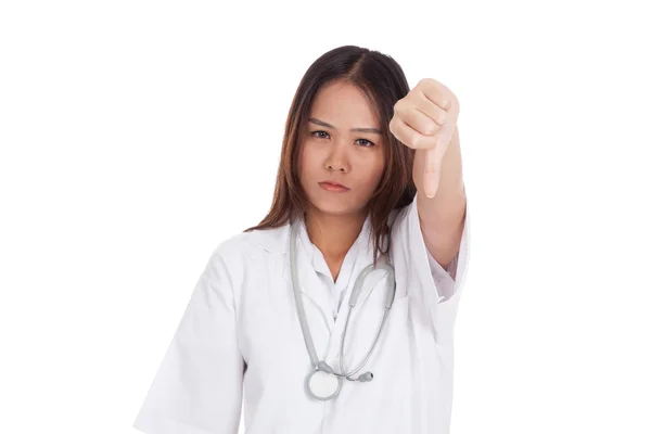 Young Asian female doctor angry show thumbs down — Stock Photo, Image