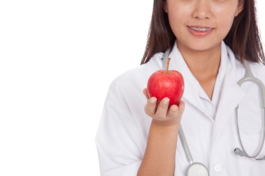 Genç Asyalı kadın doktor gülümseme yakından apple göster