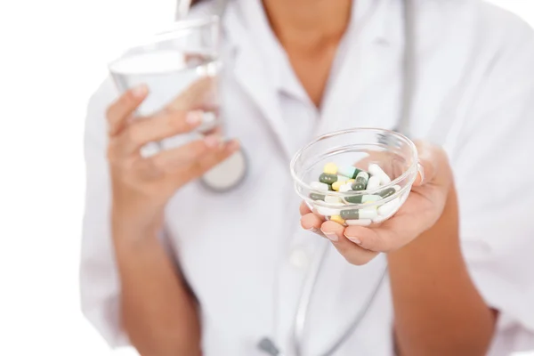 Doctor with water and medicine — Stock Photo, Image