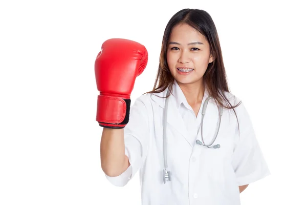 Young Asian female doctor with boxing glove — Stock Photo, Image