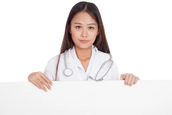 Young Asian female doctor show thumbs up  behind blank white bil — Stock Photo, Image