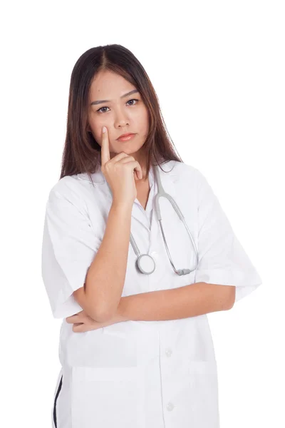 Portrait of Asian young female doctor thinking — Stock Photo, Image