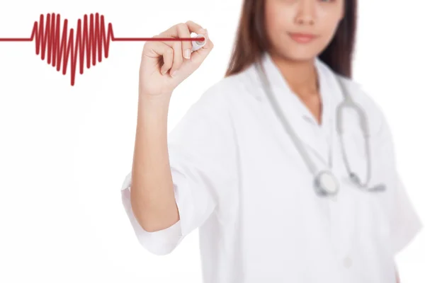 Young Asian female doctor draw heart wave with red marke — Stock Photo, Image