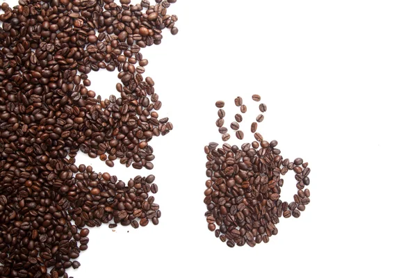 Roasted coffee beans in man and coffee mug shape — Stock Photo, Image