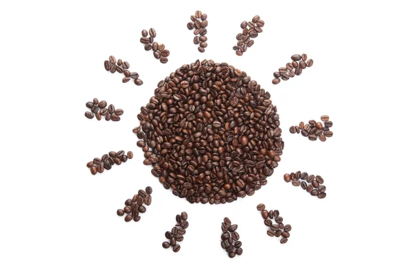 Roasted coffee beans in sun shape — Stock Photo, Image