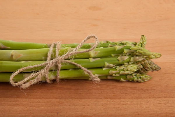 Tied fresh raw asparagus — Stock Photo, Image