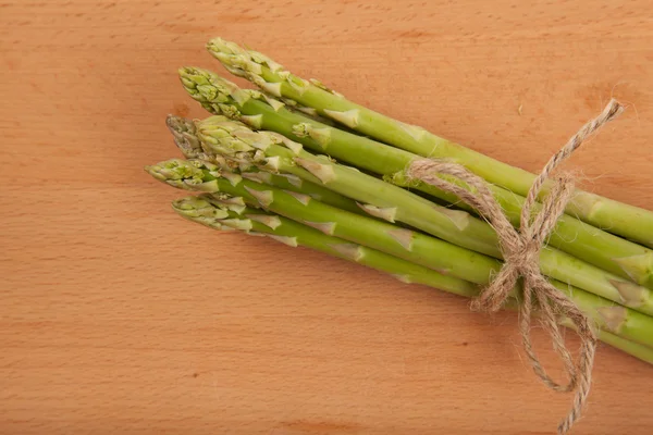 Tied fresh raw asparagus — Stock Photo, Image