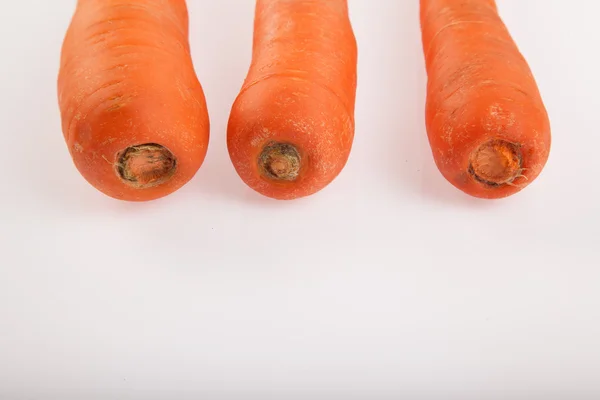 Tres zanahorias sobre fondo blanco —  Fotos de Stock