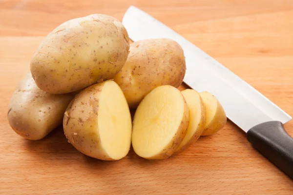 Cut potatoes on cutting board Stock Image