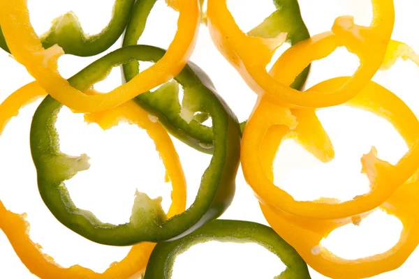 Corte pimentas amarelas e verdes — Fotografia de Stock