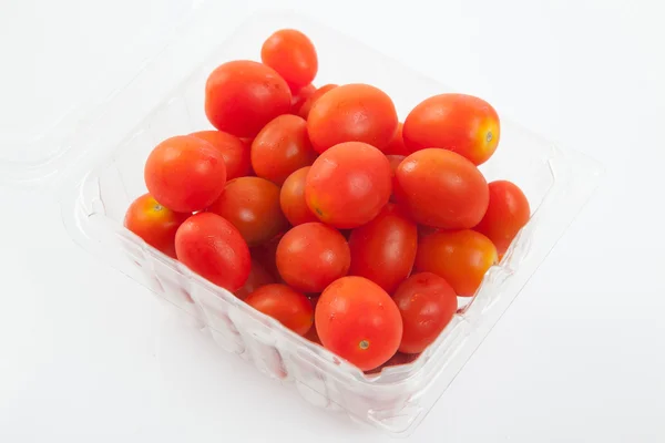 Pomodori ciliegia rossi in una scatola Foto Stock Royalty Free