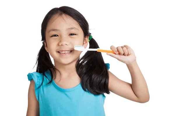 Pouco asiático menina com escova de dentes — Fotografia de Stock