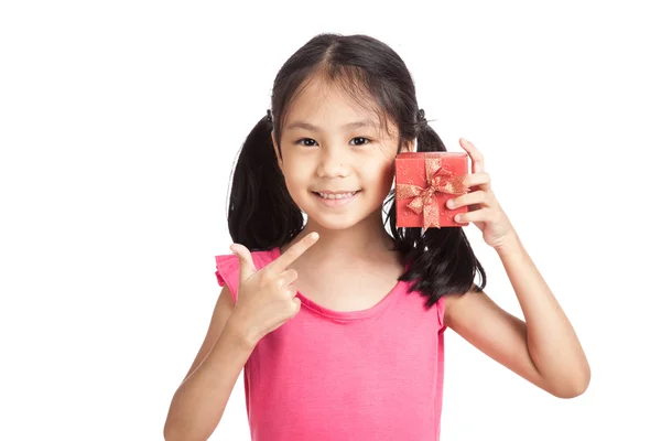 Happy little asian girl with red gift box — Zdjęcie stockowe