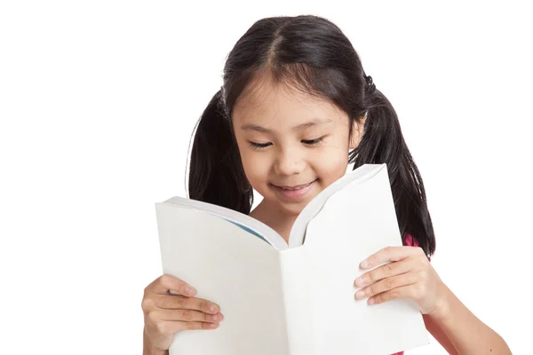 Feliz pouco ásia menina ler um livro — Fotografia de Stock
