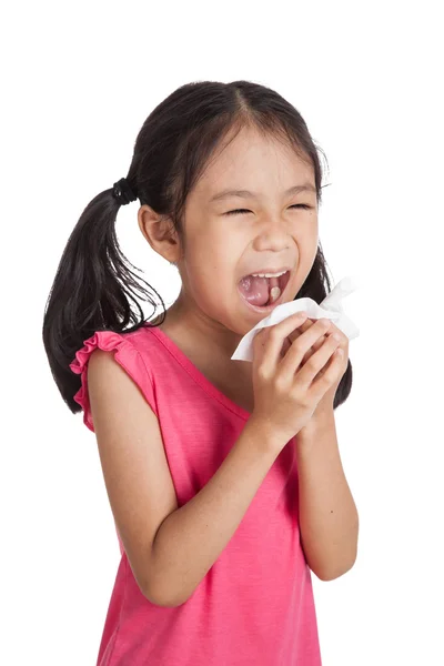 Little asian girl sneeze with napkin paper — Stok fotoğraf