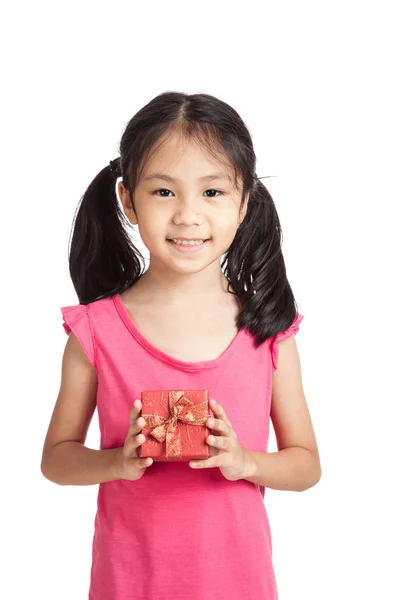 Happy little asian girl with red gift box — Stok fotoğraf