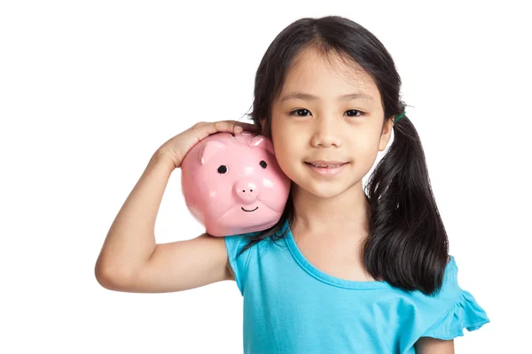 Little asian girl smile with piggy bank — Stock Photo, Image