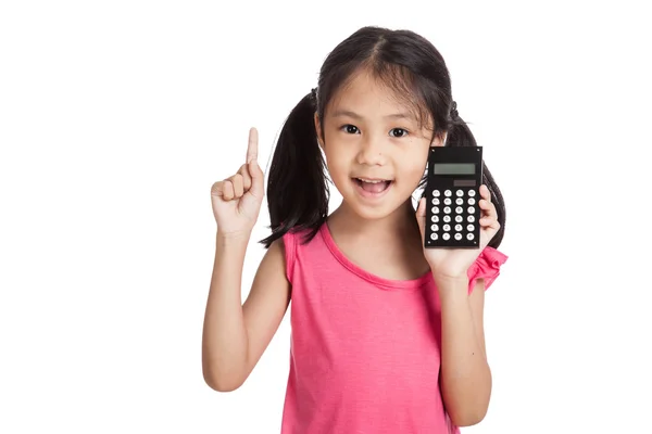 Piccola ragazza asiatica con una calcolatrice Foto Stock Royalty Free