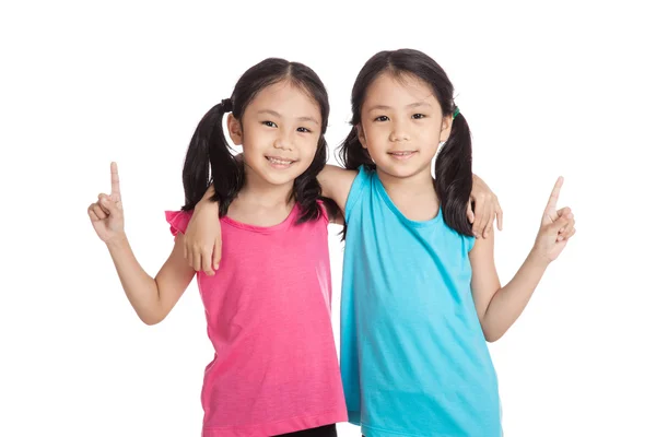 Happy Asian twins girls  smile show one finger — Stock Photo, Image