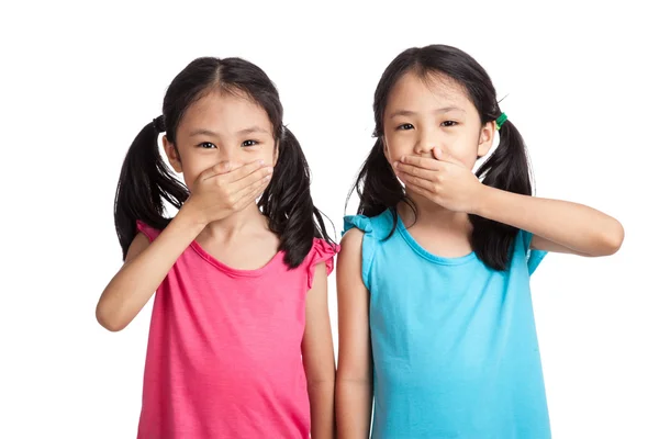 Bliźniaki azjatyckich dziewcząt zamykać w ich usta — Zdjęcie stockowe