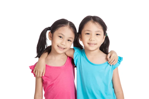 Heureux asiatique jumeaux filles sourire — Photo