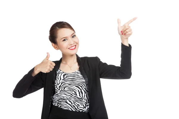 年轻的亚洲业务的女人点和竖起大拇指 — 图库照片