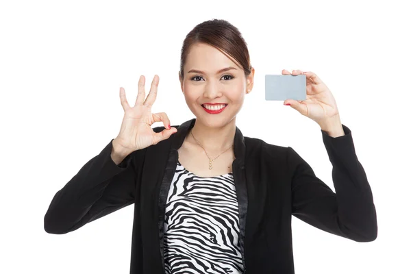 Young Asian business woman show OK with a blank card — Stock Photo, Image