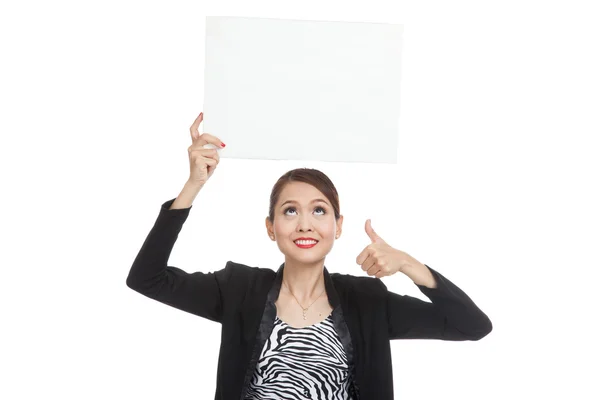 Junge asiatische Geschäftsfrau zeigen Daumen nach oben mit weißen leeren Zeichen — Stockfoto