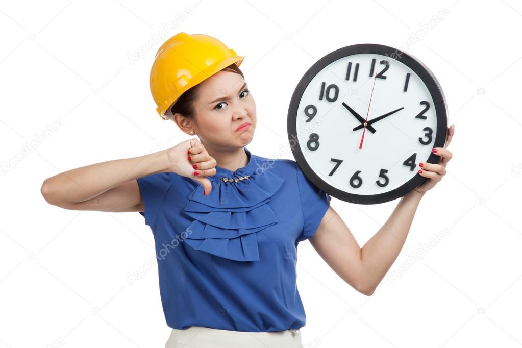 Asian engineer woman thumbs down with a clock