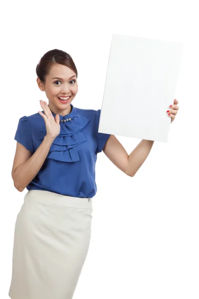 Excited young Asian woman with blank sign — Stock Photo, Image