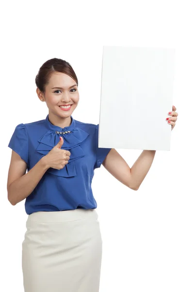 Young Asian woman show thumbs up with blank sign — Stock Photo, Image