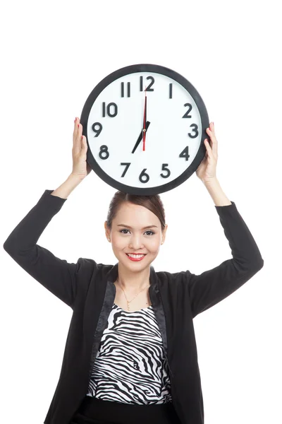 Young Asian business woman with a clock — Stock Photo, Image