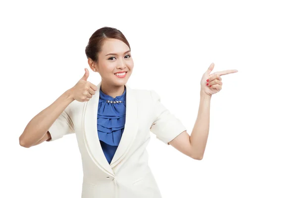 Aziatische zakenvrouw wijs lege ruimte en duimen omhoog — Stockfoto