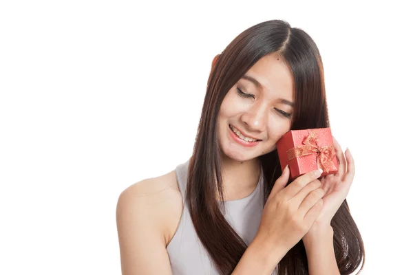 Beautiful young Asian woman with red gift box — Stock Photo, Image