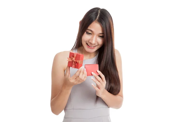 Beautiful young Asian woman with red gift box — Stock Photo, Image