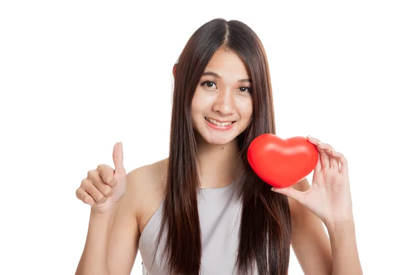 Beautiful young Asian woman thumbs up with red heart — Stock Photo, Image