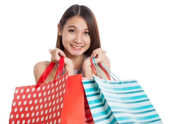 Beautiful young Asian woman with shopping bags — Stock Photo, Image