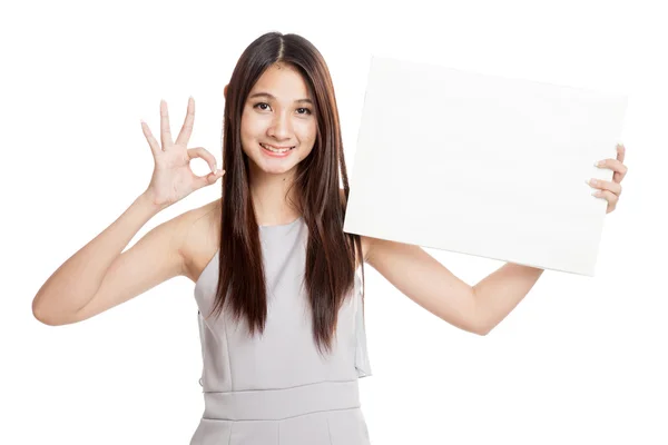 Beautiful young Asian woman show OK with blank sign — Stock Photo, Image