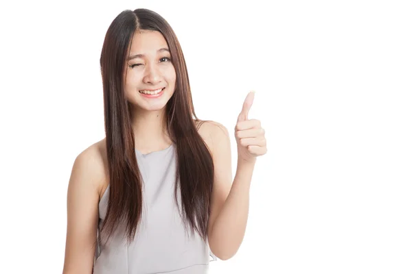 Beautiful young Asian woman thumbs up — Stock Photo, Image