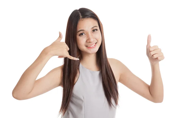 Young Asian woman thumbs up show with phone gesture — Stock Photo, Image
