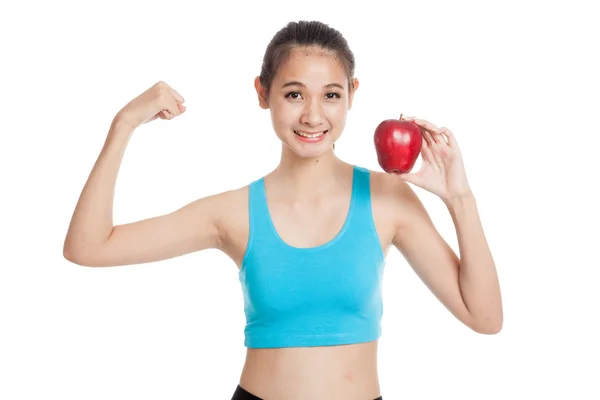 Belle asiatique sain fille flexion biceps avec rouge pomme — Photo