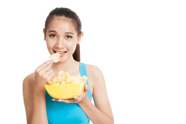 Beautiful Asian healthy girl  eat potato chips — Stock Photo, Image